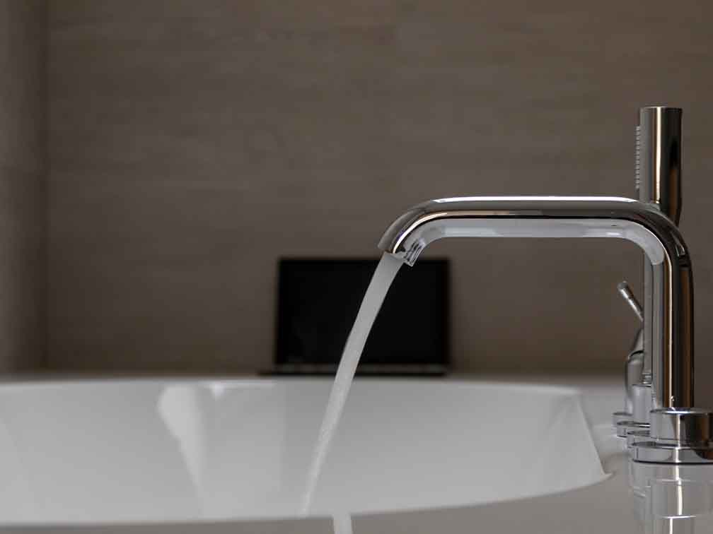 Bath tub tap filling up bath Bath tub tap filling up bath